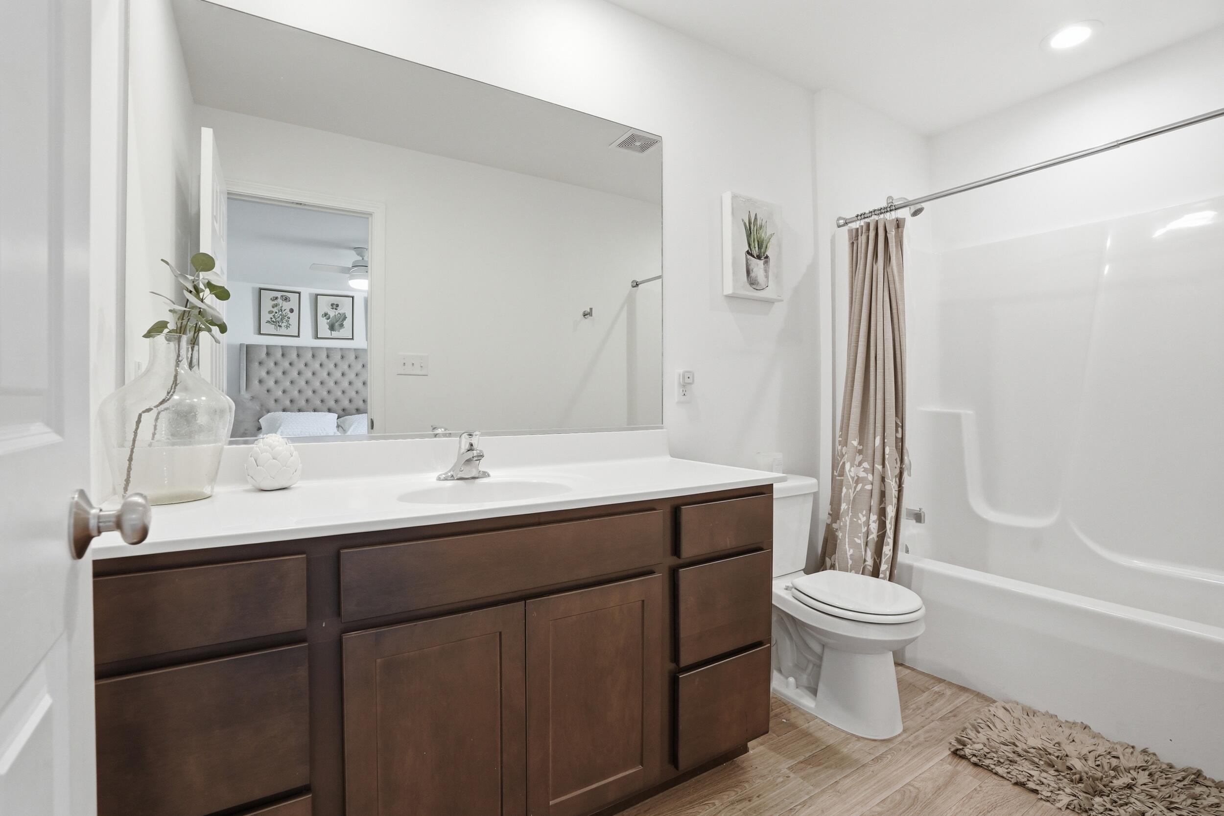 8658 Valley Forge Way Lowell, IN 46356 - Photo 19 of 23 a bathroom with a sink toilet and shower