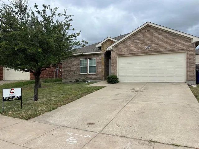 a front view of house with yard