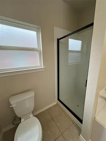 a bathroom with a toilet