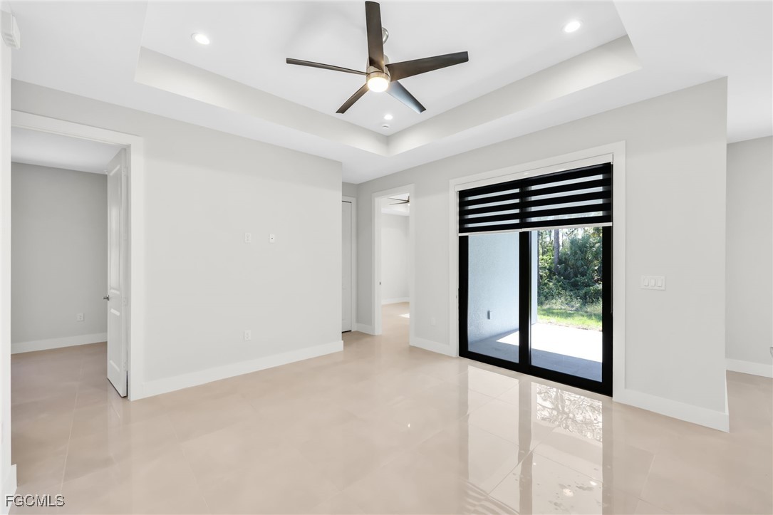 8771-8773 Buckingham Road Lehigh Acres, FL 33971 - Photo 23 of 34 a view of an empty room with a window