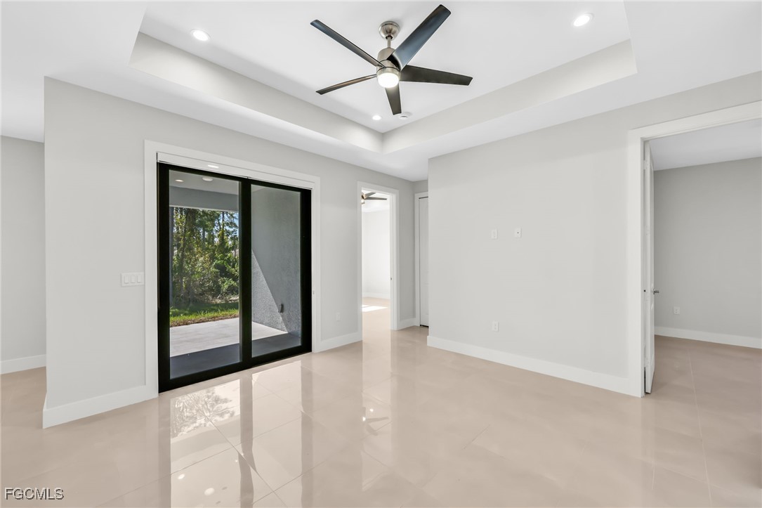 8771-8773 Buckingham Road Lehigh Acres, FL 33971 - Photo 25 of 34 a view of an empty room with a window