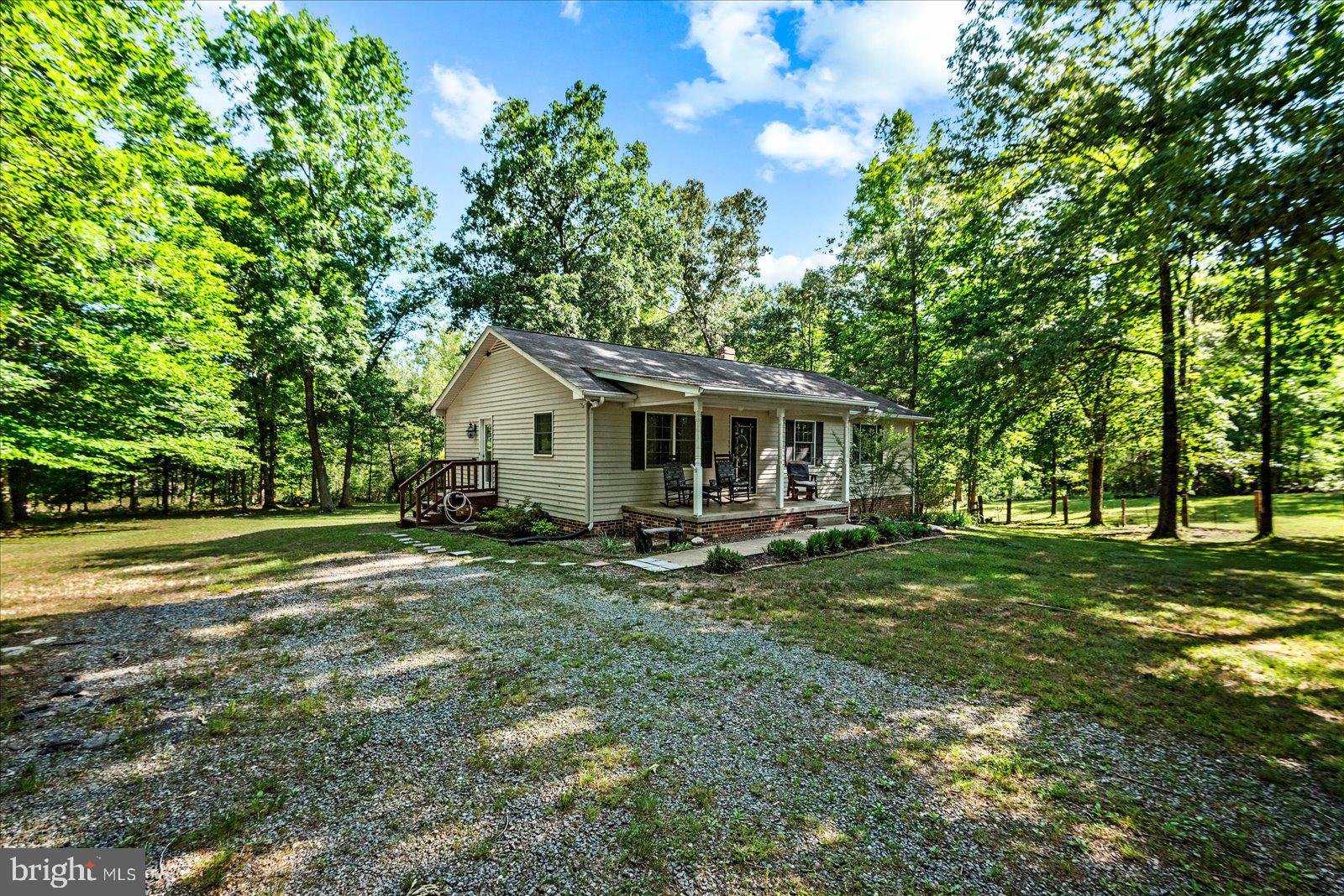 804 Buggy Lane Rochelle, VA 22738 - Photo 6 of 50 a view of a house with a yard and sitting area