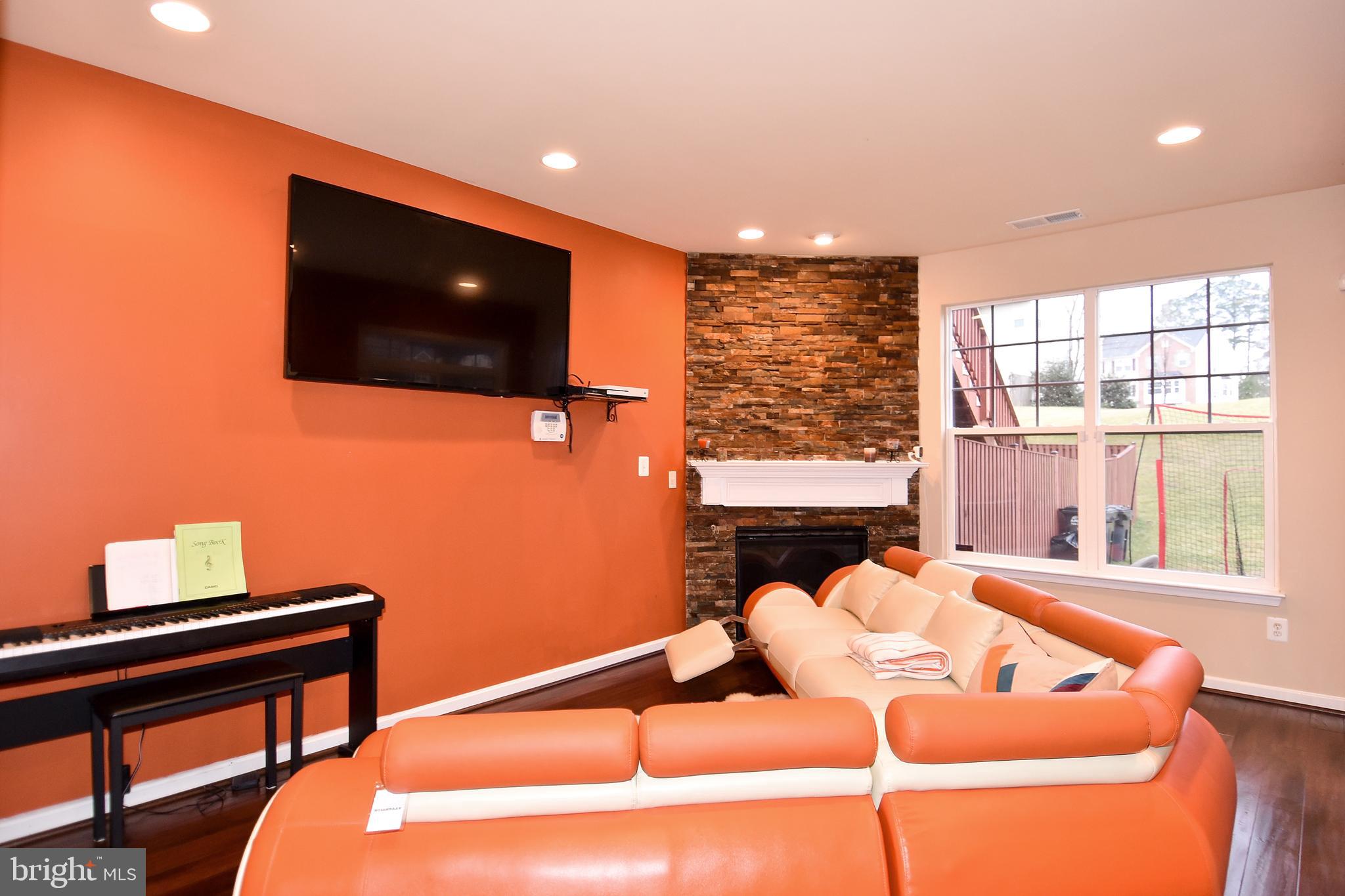 143 Short Branch Road Stafford, VA 22556 - Photo 29 of 36 Rec Room with Gas Fireplace