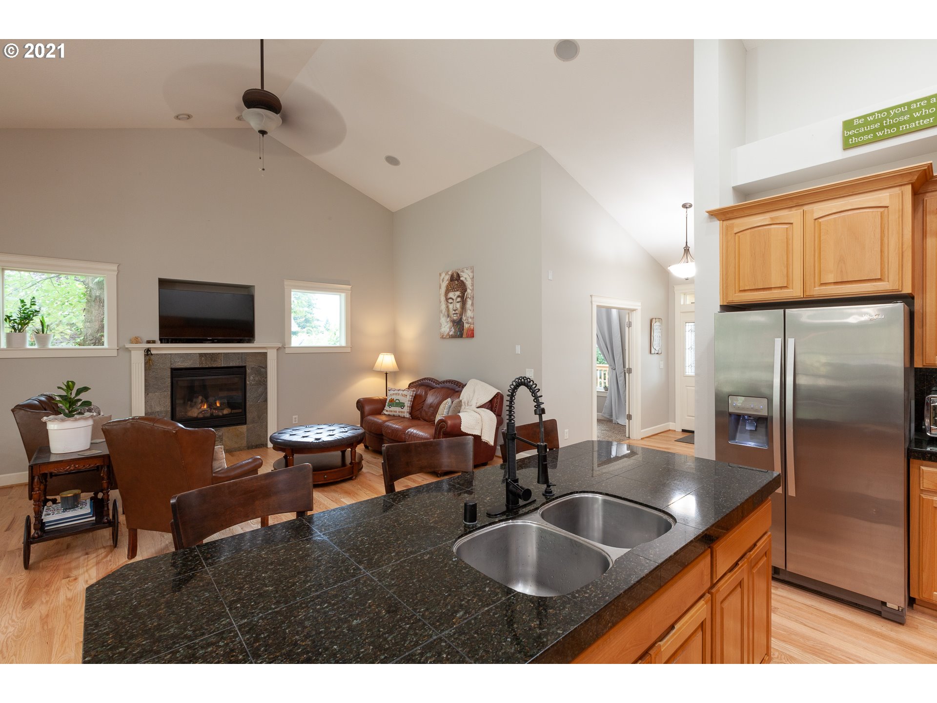875 Northwest Angel Heights Road Stevenson, WA 98648 - Photo 16 of 32 a kitchen with kitchen island a dining table and chairs