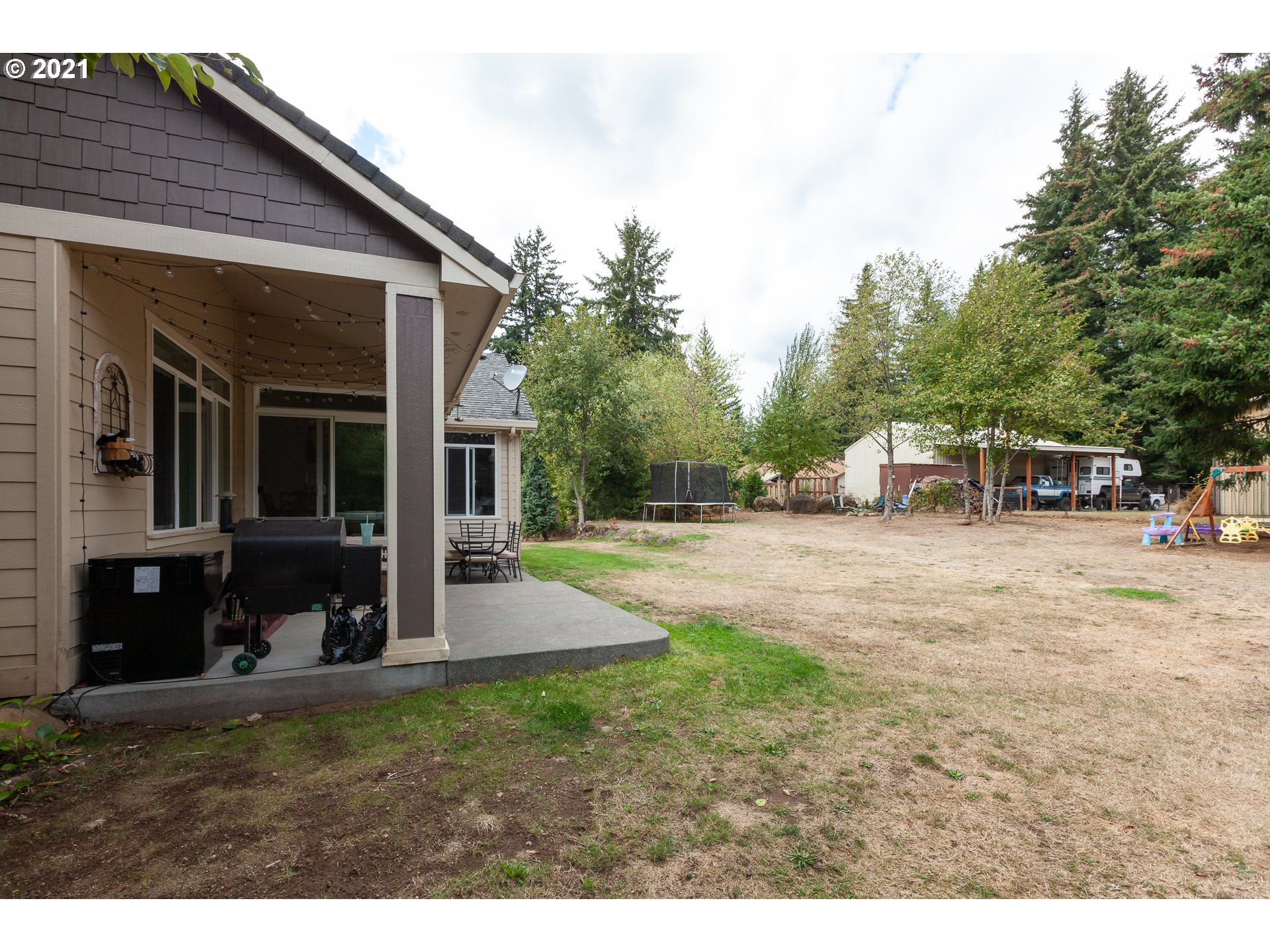 875 Northwest Angel Heights Road Stevenson, WA 98648 - Photo 32 of 32 a view of a house with backyard and porch