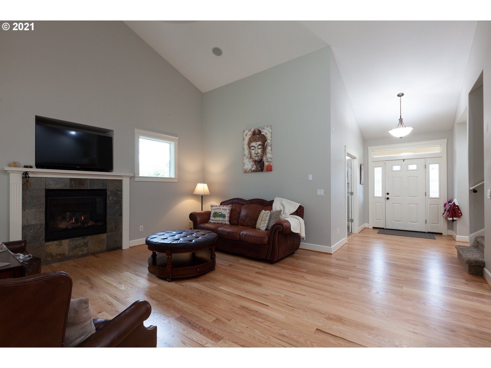 875 Northwest Angel Heights Road Stevenson, WA 98648 - Photo 8 of 32 a living room with furniture and a fireplace