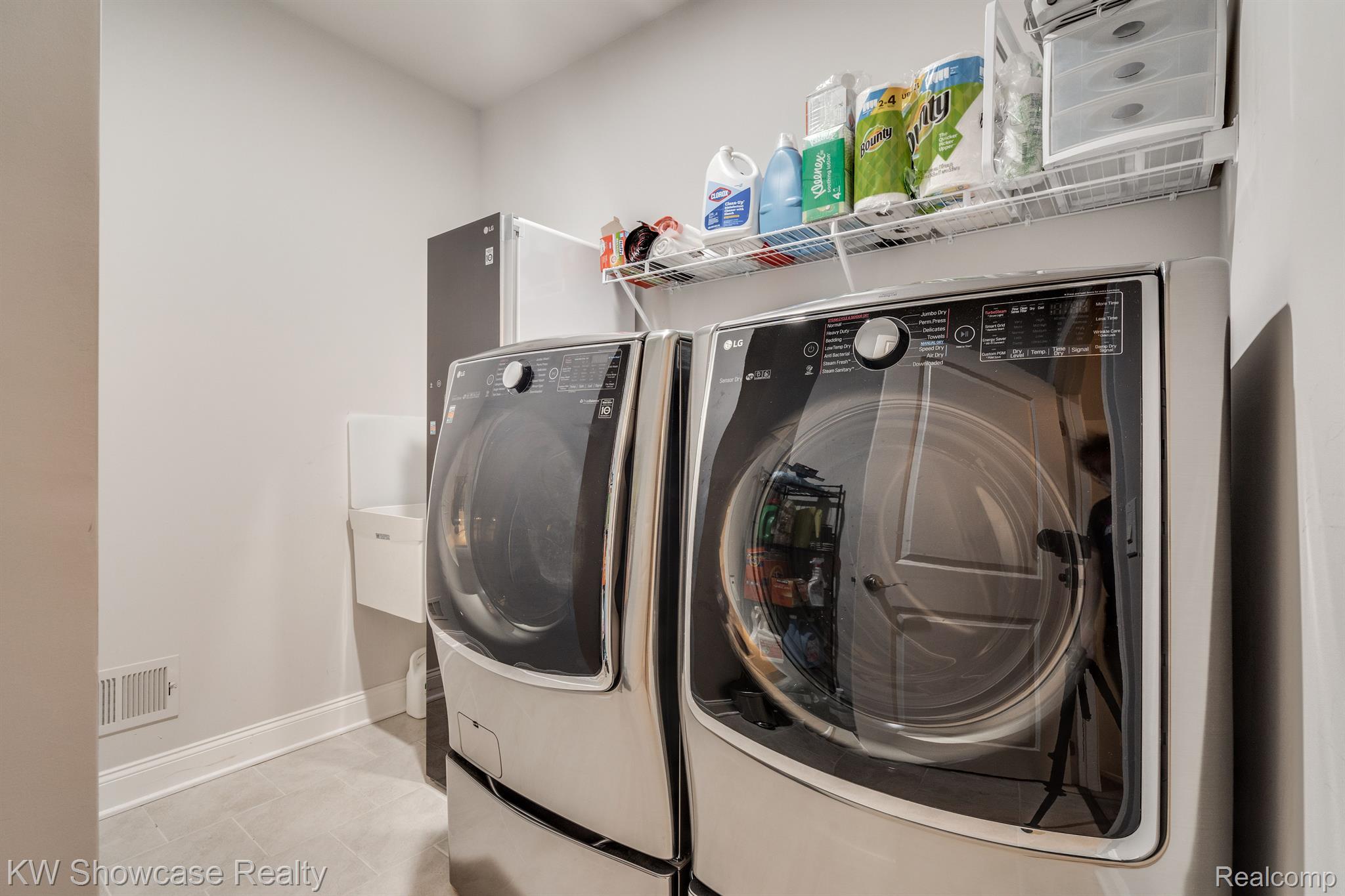 42768 Cardinal Way Novi, MI 48375 - Photo 26 of 42 The first floor laundry room.