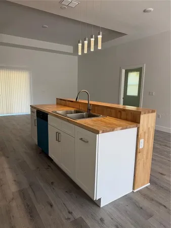 a view of cabinets with wooden floor