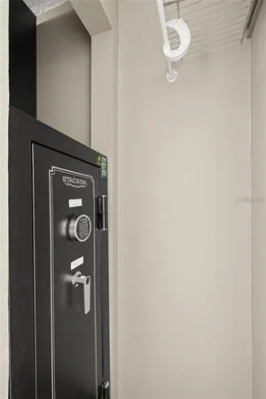 a bathroom with a shower curtain and a sink