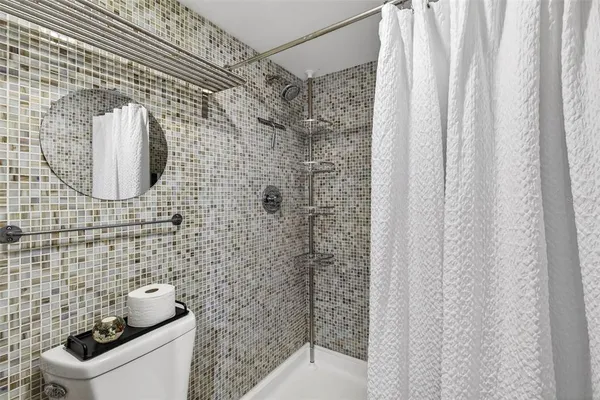 a view of swimming pool with outdoor seating