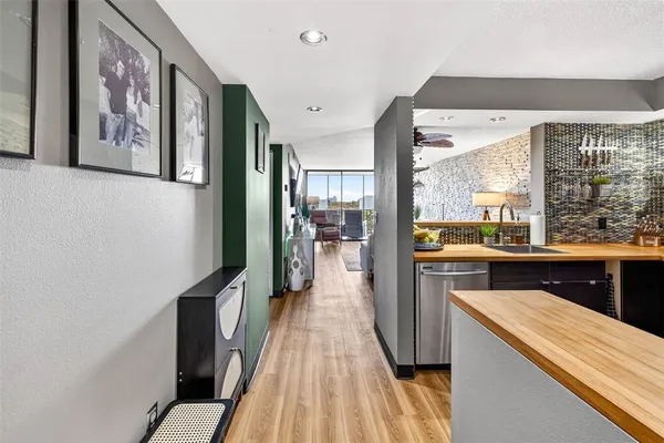 a swimming pool with chairs