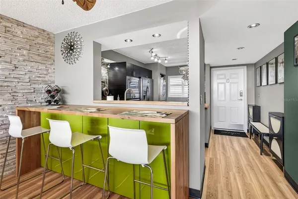 a view of a kitchen from the hallway