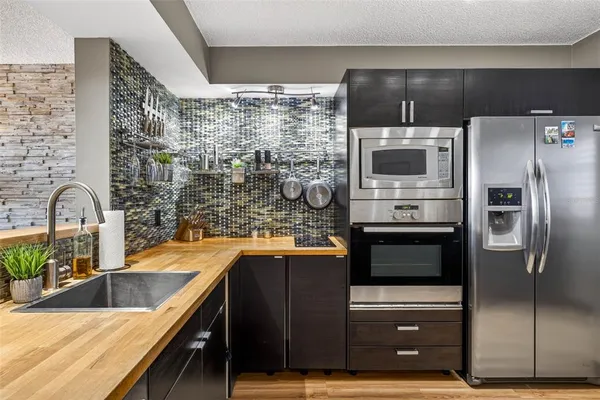 a view of a sink and an oven