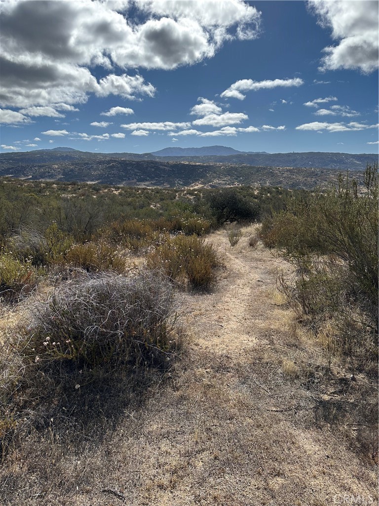 0 Ardia Road Hemet, CA 92544 - Photo 14 of 20 a view of a yard of mountains and valleys