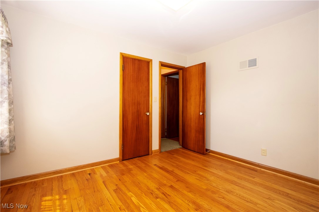 2456 Batdorf Road Wooster, OH 44691 - Photo 15 of 22 Spare room with light wood finished floors and baseboards