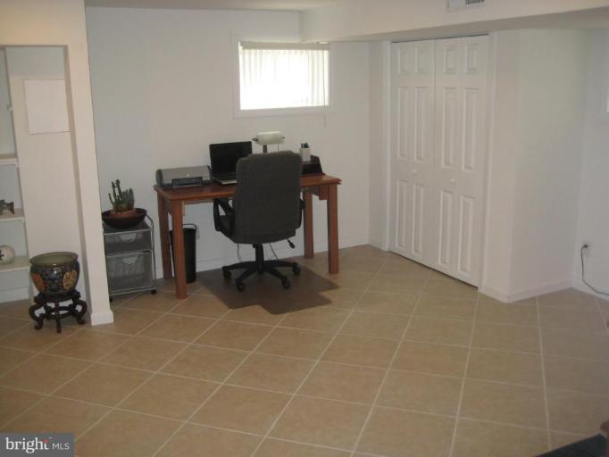 9607 Flower Avenue Silver Spring, MD 20901 - Photo 15 of 24 Lower level bedroom