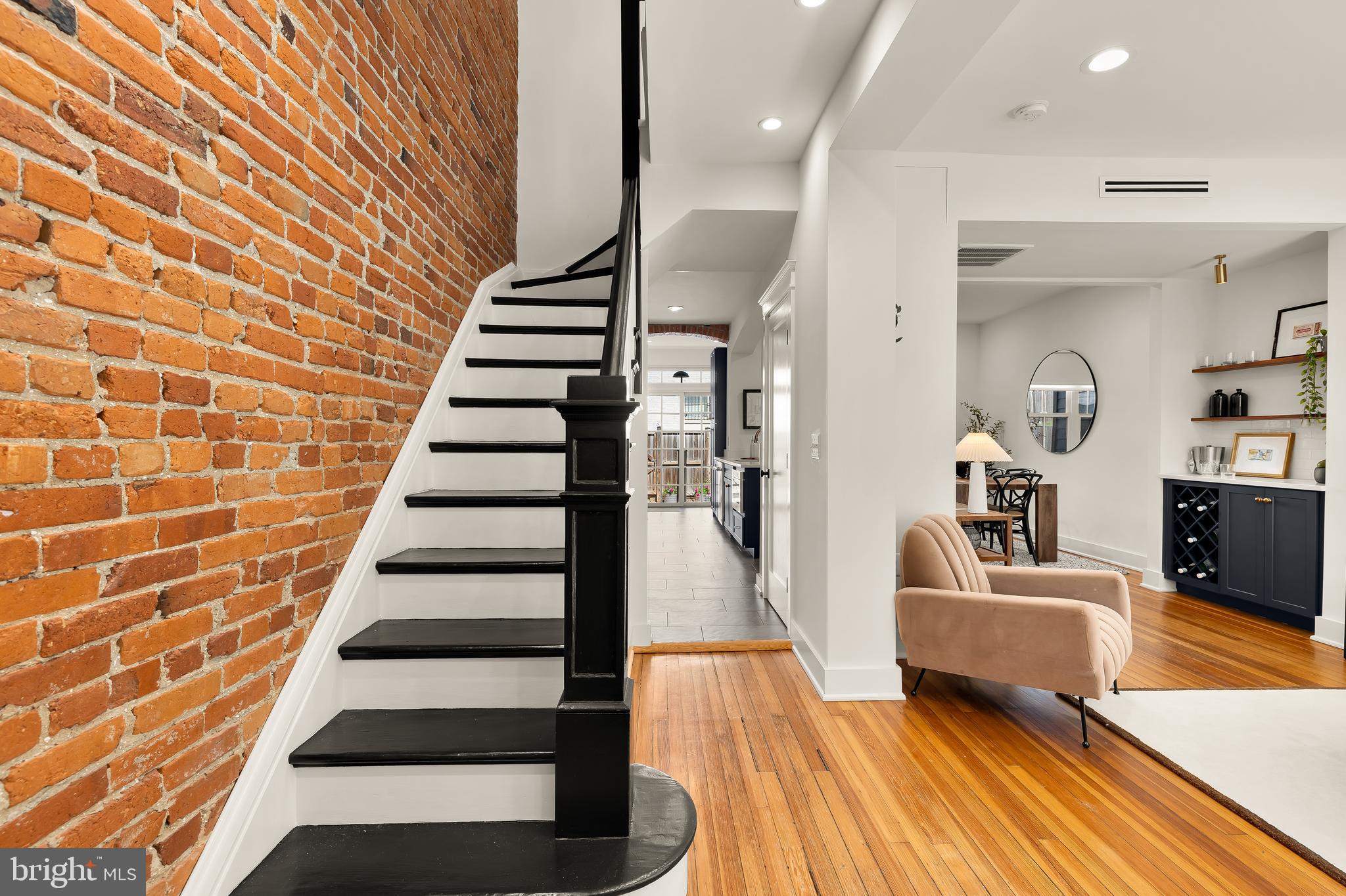 409 Columbia Road Northwest Washington, DC 20001 - Photo 2 of 41 a view of a living room with furniture and wooden floor