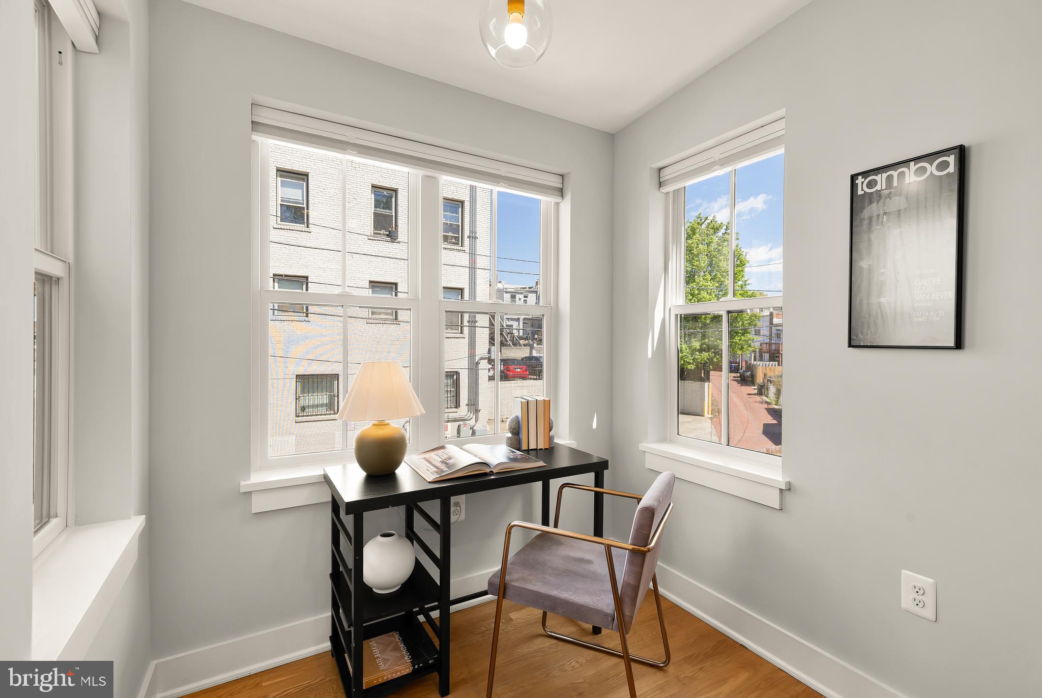 409 Columbia Road Northwest Washington, DC 20001 - Photo 25 of 41 a living room with furniture and a window