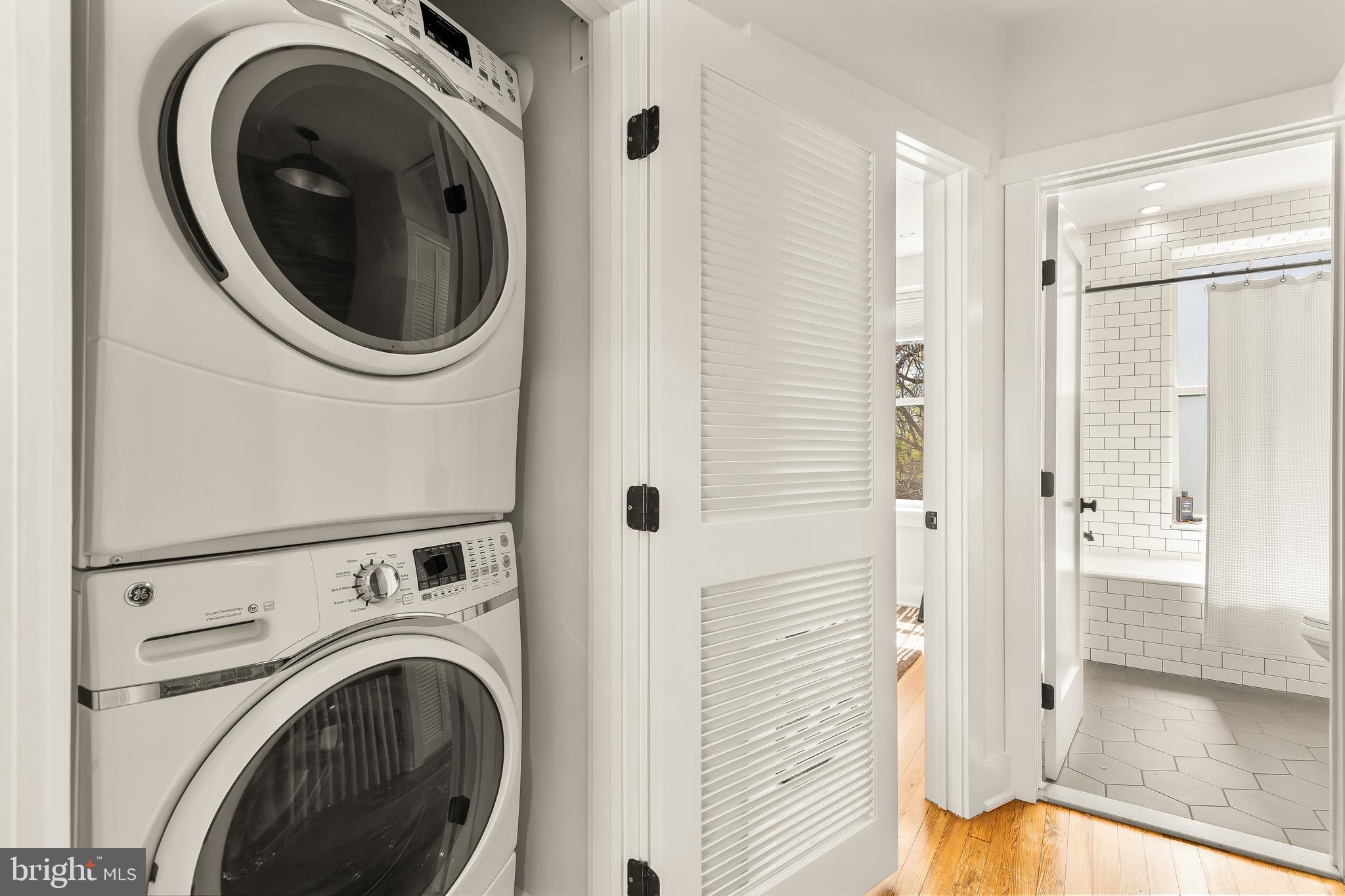 409 Columbia Road Northwest Washington, DC 20001 - Photo 29 of 41 a view of a hallway with washer and dryer