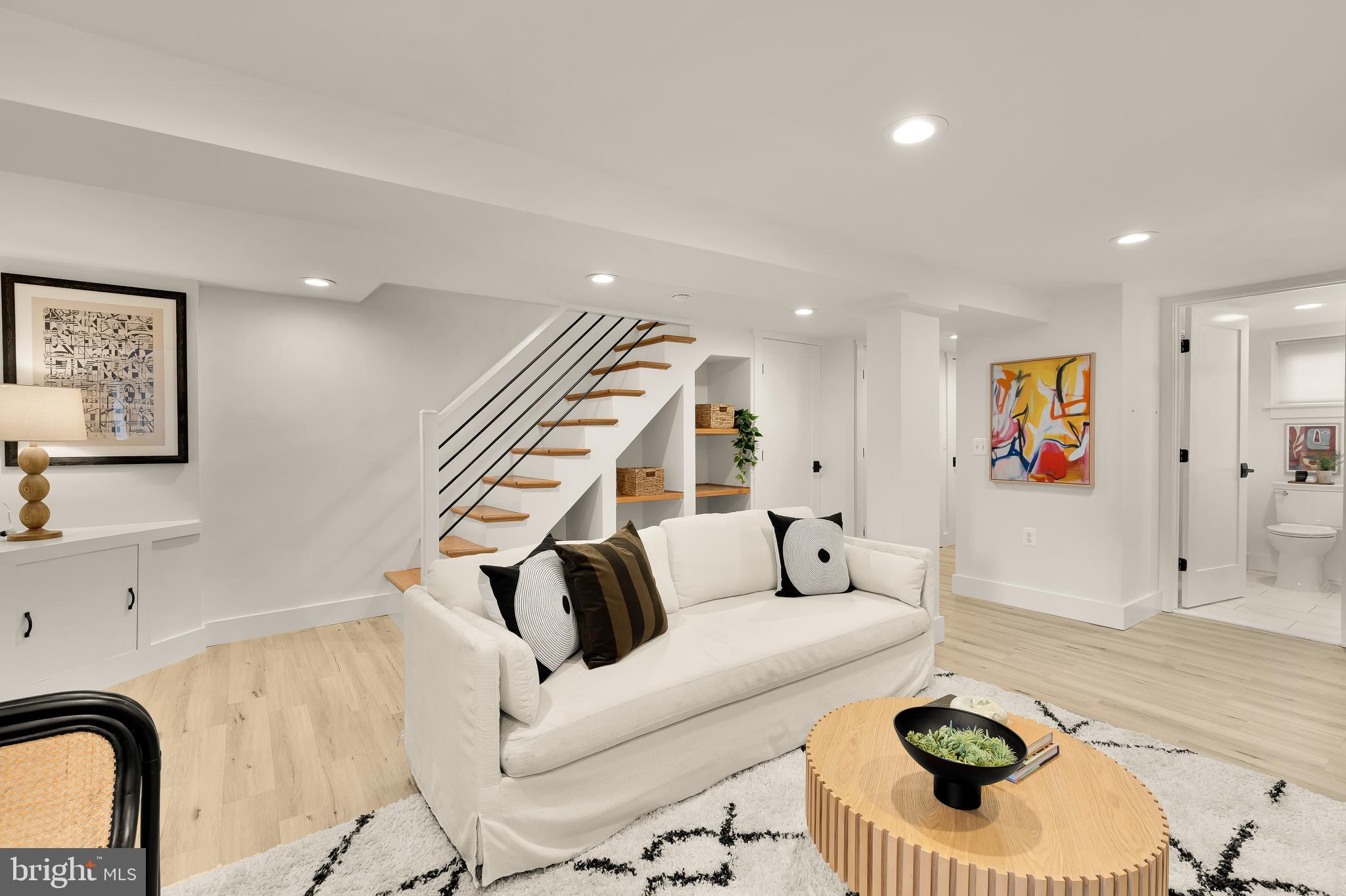409 Columbia Road Northwest Washington, DC 20001 - Photo 38 of 41 a living room with furniture and wooden floor