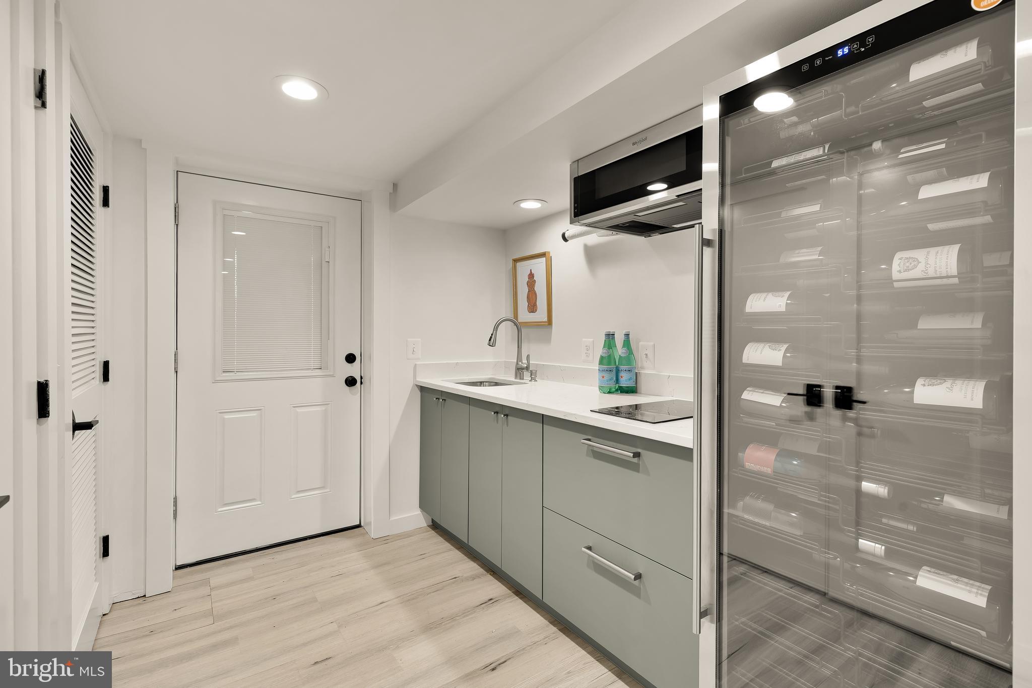 409 Columbia Road Northwest Washington, DC 20001 - Photo 40 of 41 a spacious bathroom with a granite countertop sink a mirror and a shower