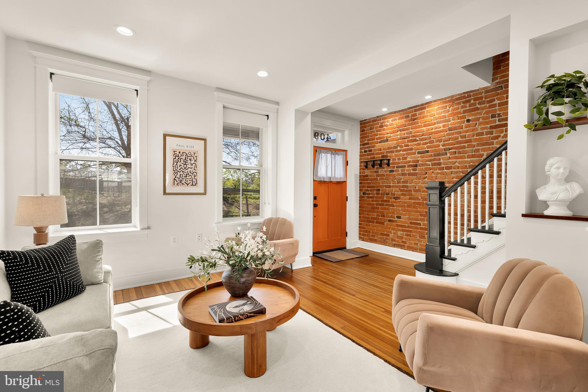 409 Columbia Road Northwest Washington, DC 20001 - Photo 5 of 41 a living room with furniture and a potted plant