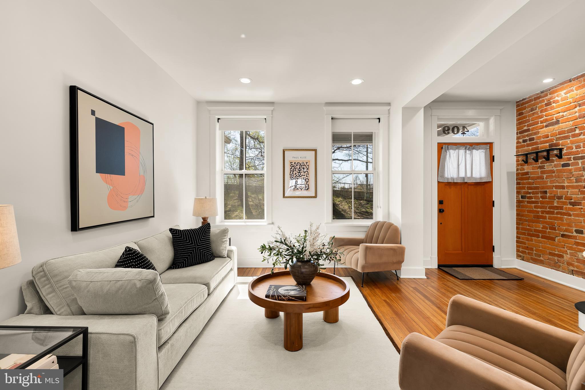 409 Columbia Road Northwest Washington, DC 20001 - Photo 6 of 41 a living room with furniture and a potted plant