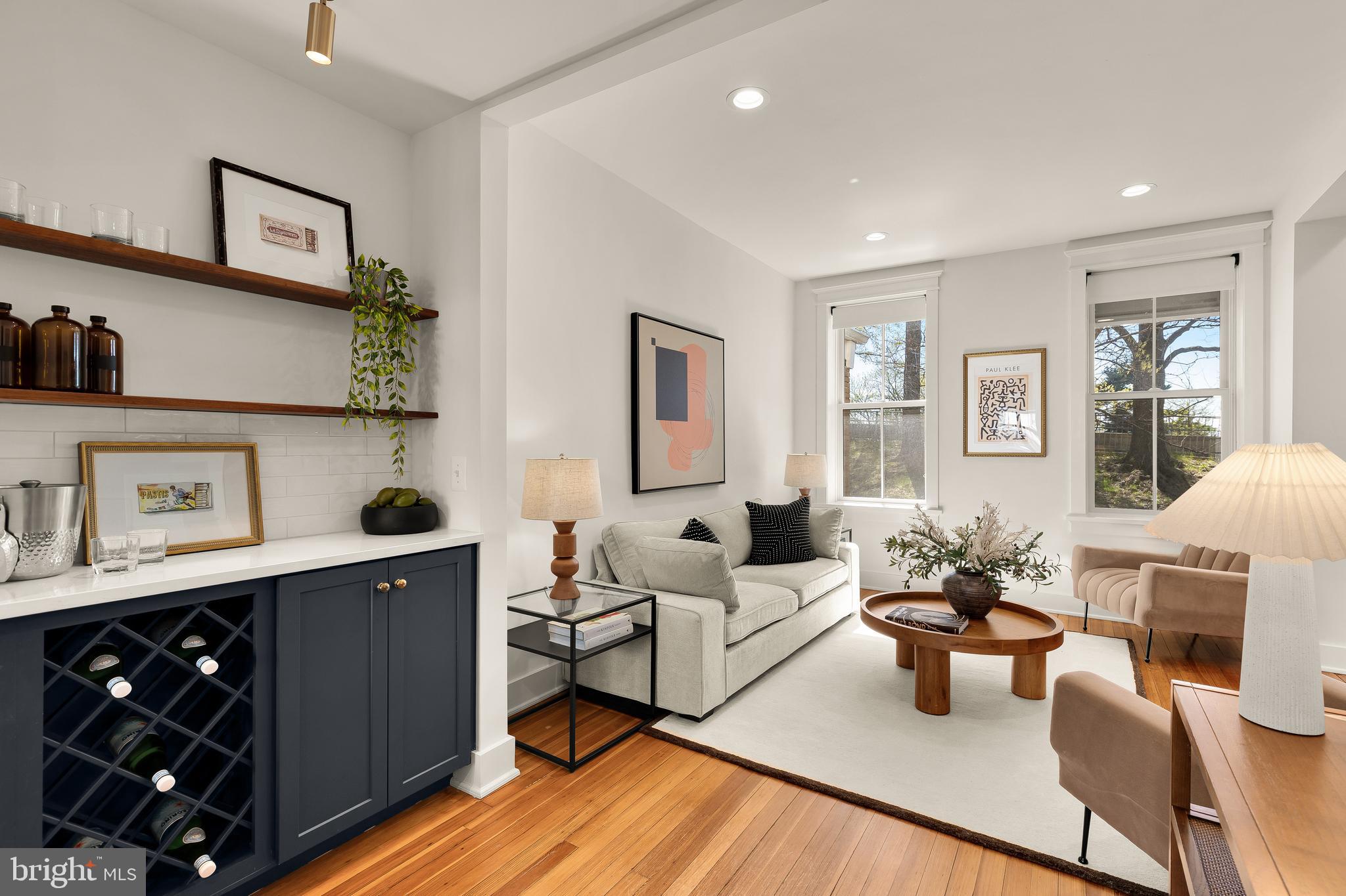 409 Columbia Road Northwest Washington, DC 20001 - Photo 8 of 41 a living room with furniture and wooden floor