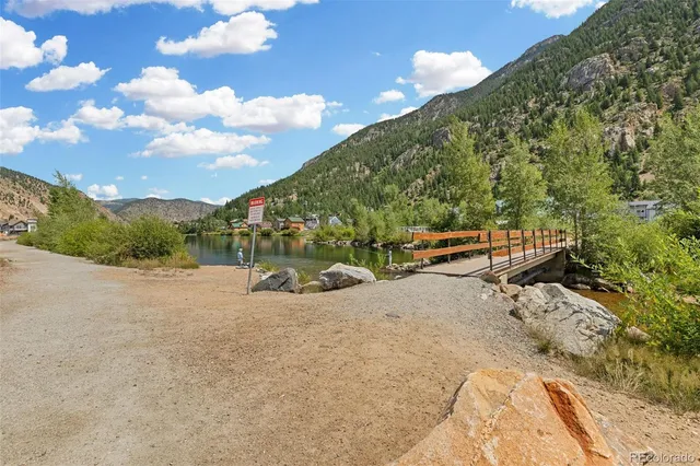 a view of a road with a yard