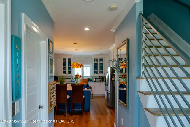 a view of a living room and dining room