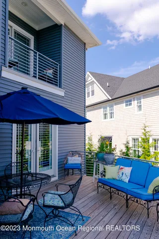 a view of a chairs and table in the patio