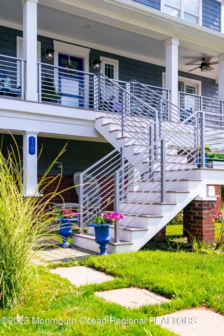 a backyard of a house with seating space