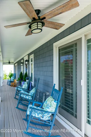 a living room with patio furniture