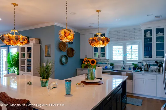 a view of a dining area with furniture window and wooden floor