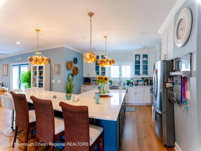a view of a dining room and furniture window and wooden floor