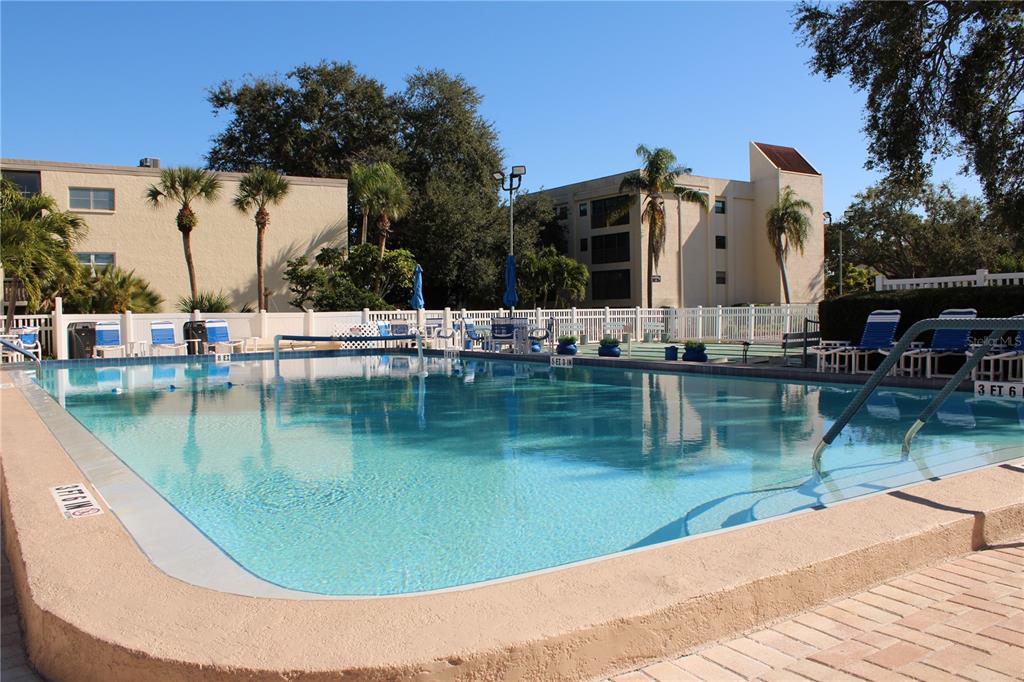 11485 Oakhurst Road, Unit 1200215 Largo, FL 33774 - Photo 51 of 68 a view of a lake with a house