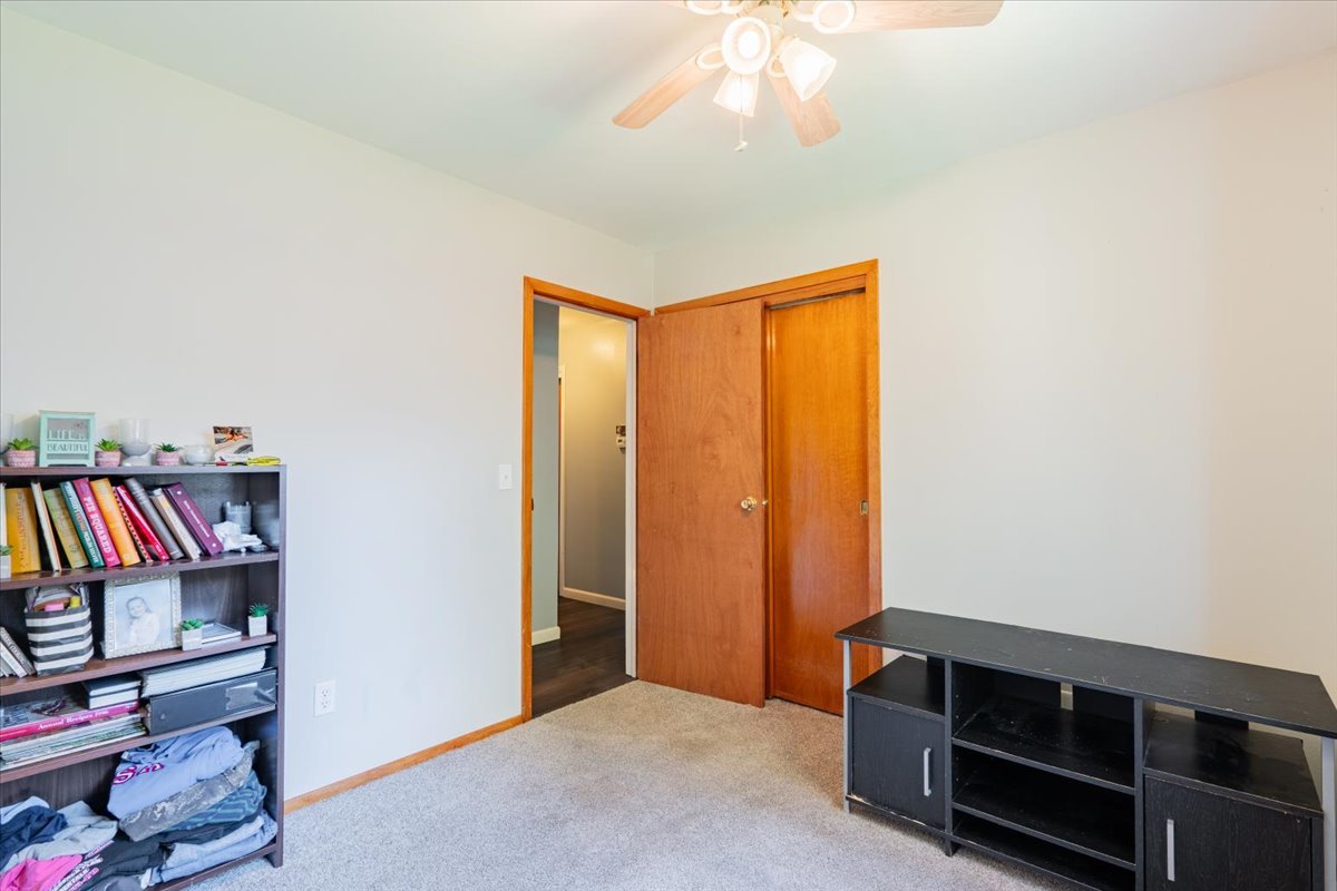 310 Rowe Drive Bloomington, IL 61701 - Photo 21 of 39 a view of an empty room with closet and a window