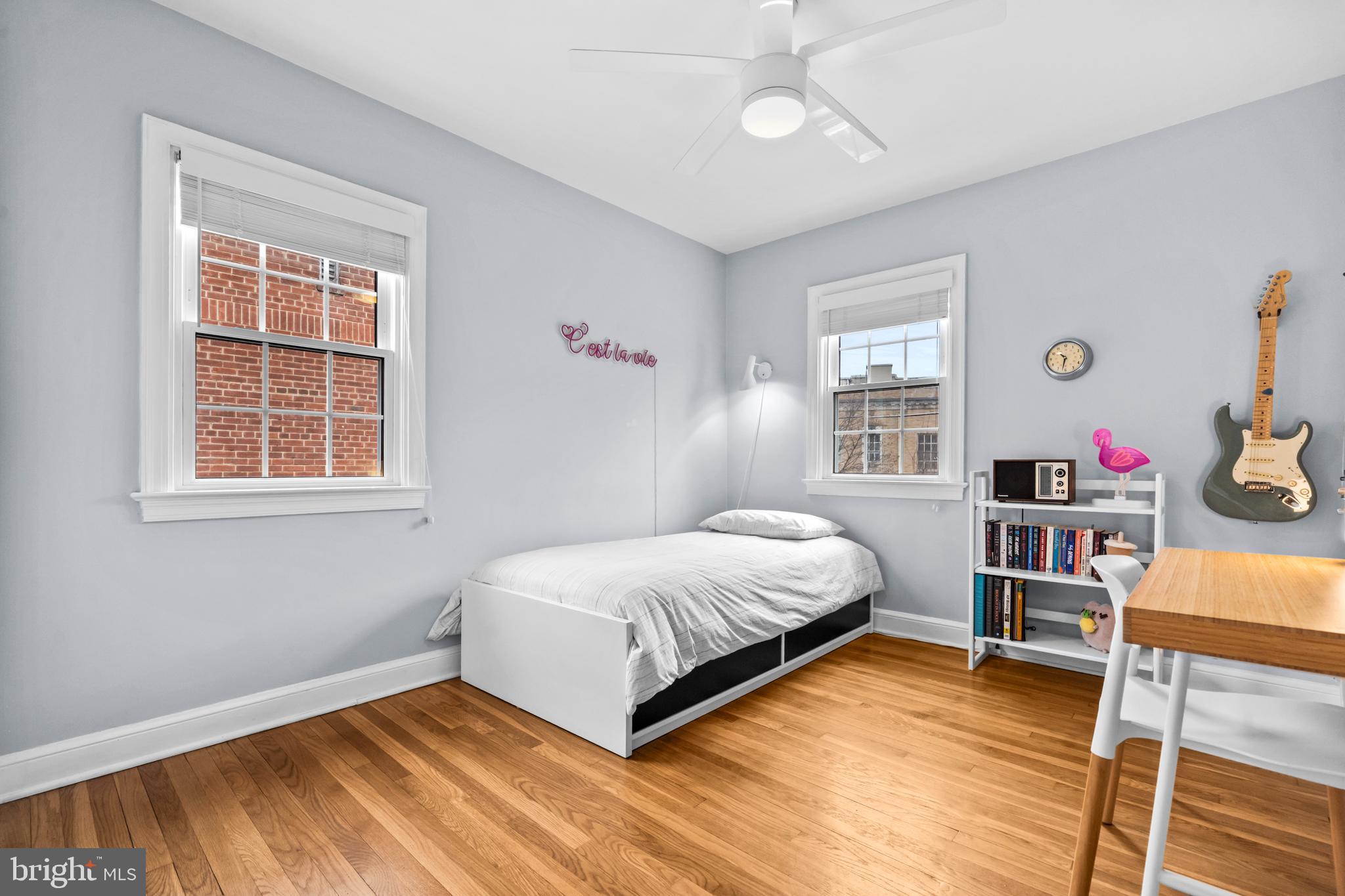 4228 40th Street Northwest Washington, DC 20016 - Photo 18 of 57 a bedroom with a bed and a window