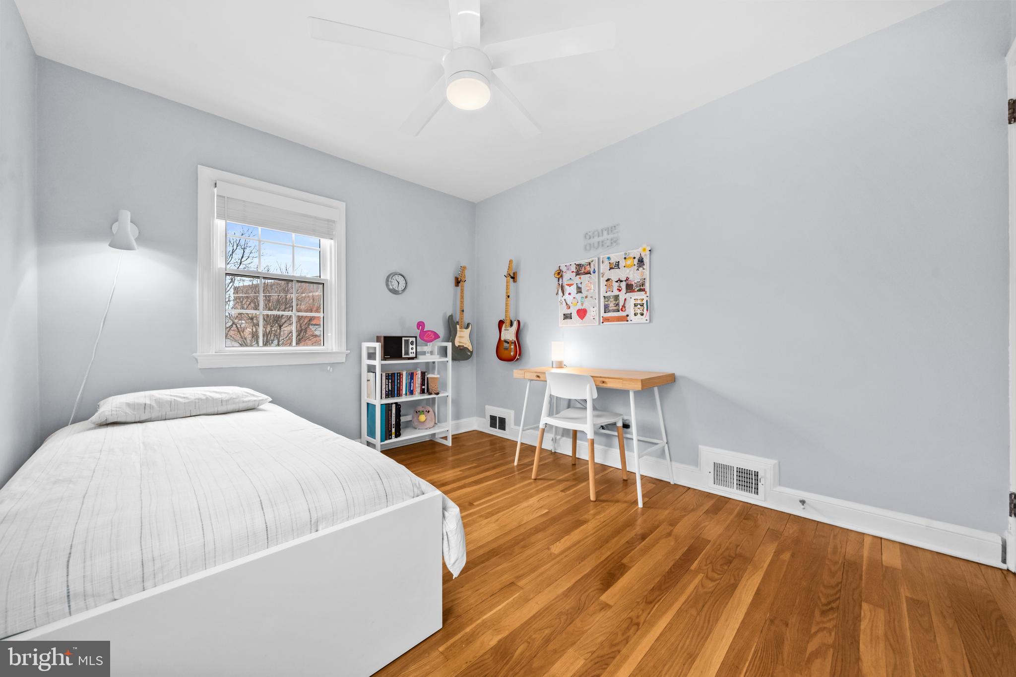 4228 40th Street Northwest Washington, DC 20016 - Photo 19 of 57 a living room with furniture and a wooden floor