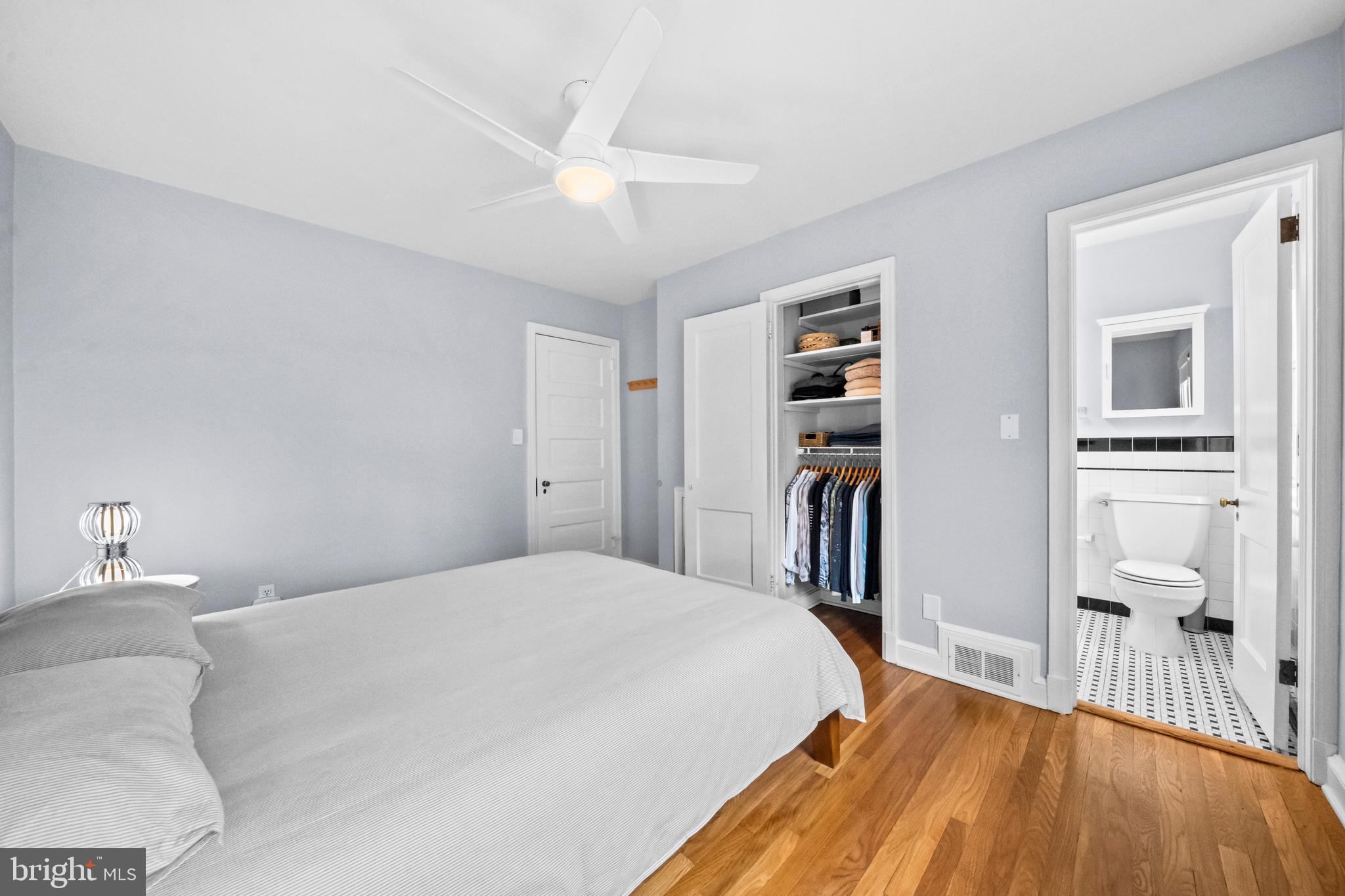 4228 40th Street Northwest Washington, DC 20016 - Photo 26 of 57 a bedroom with a bed and a book shelf