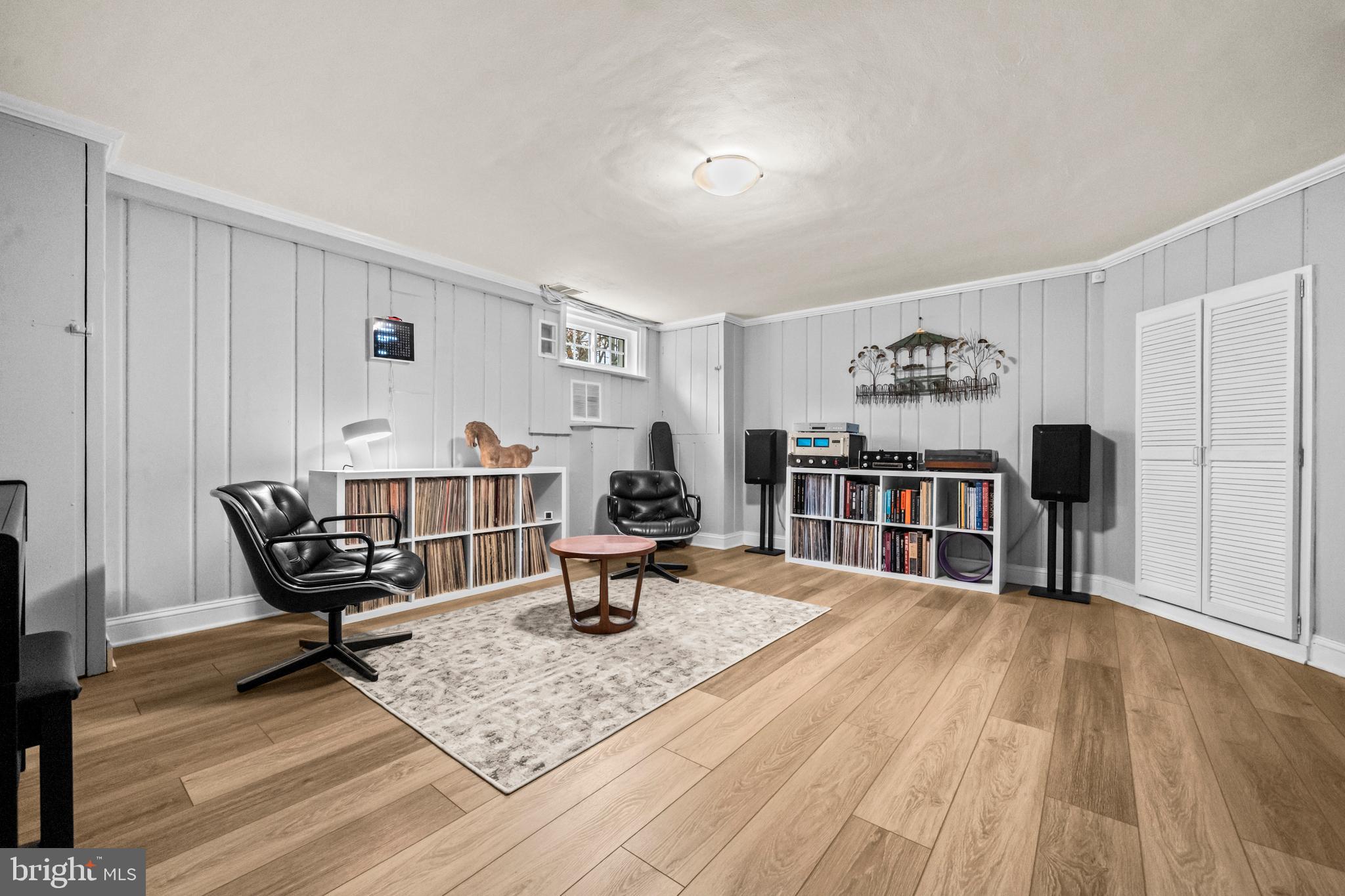 4228 40th Street Northwest Washington, DC 20016 - Photo 30 of 57 a living room with furniture and wooden floor