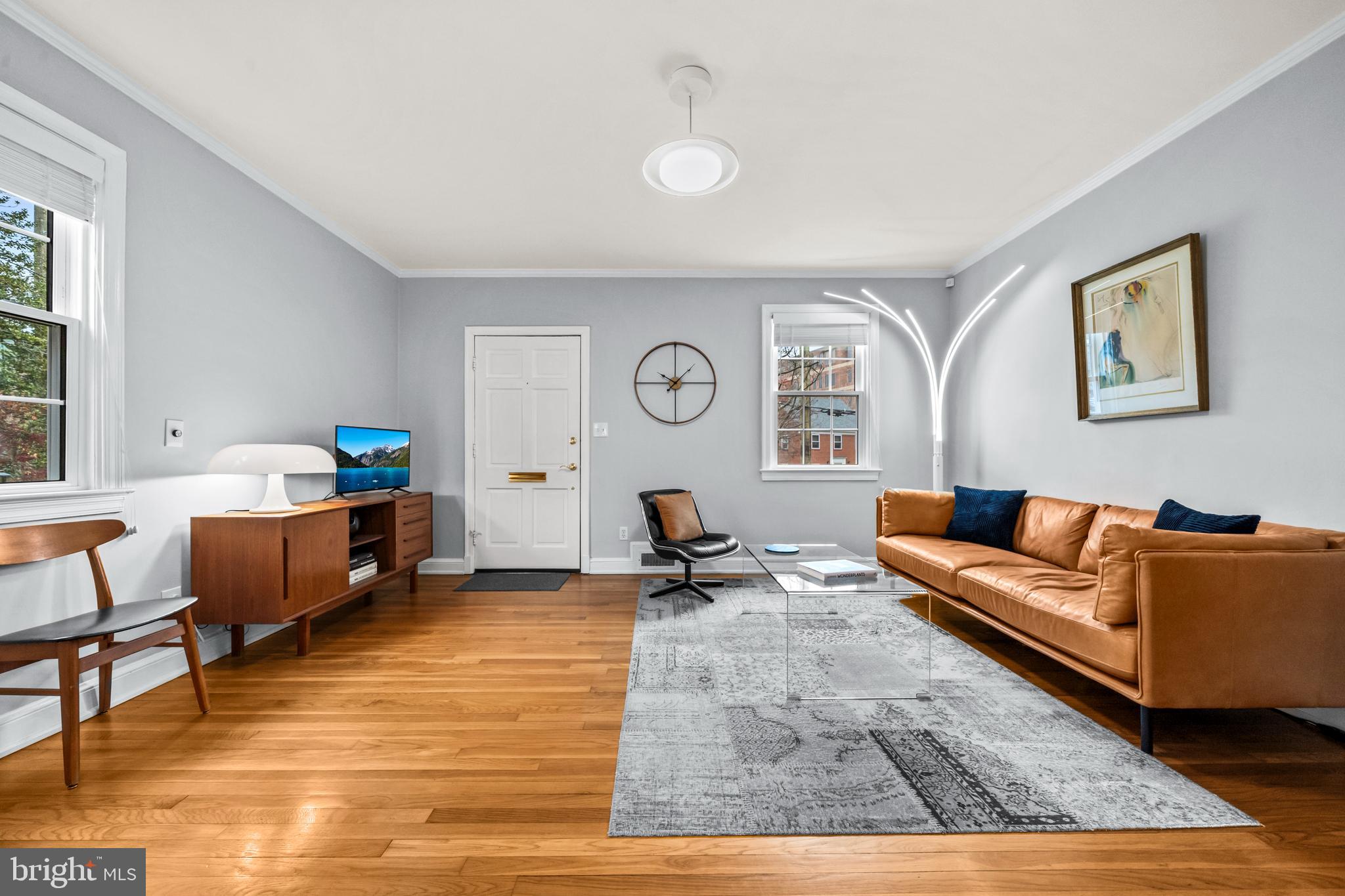 4228 40th Street Northwest Washington, DC 20016 - Photo 3 of 57 a living room with furniture and a window