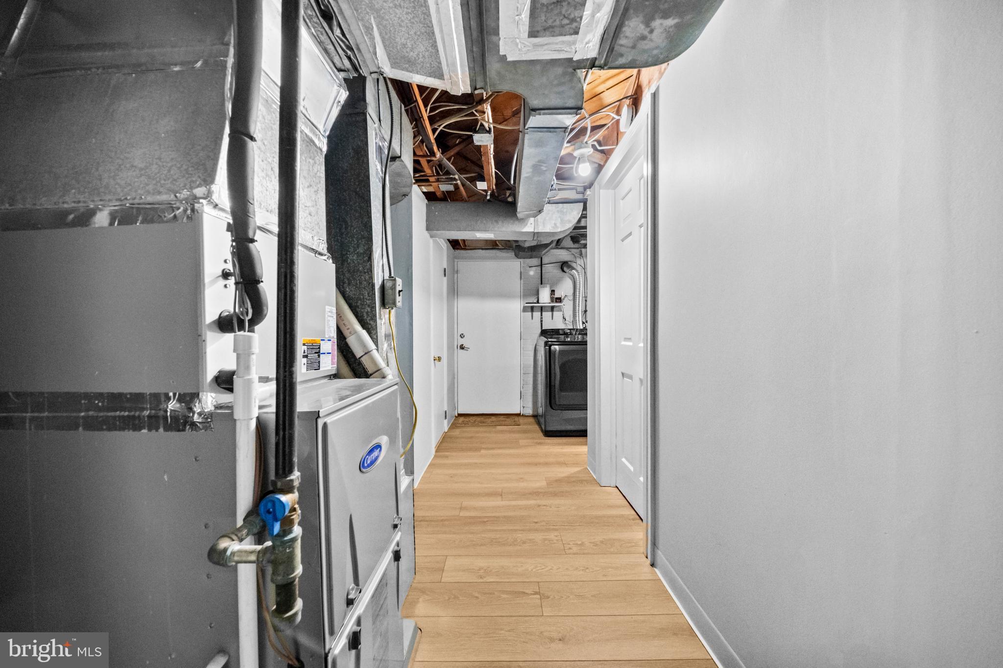 4228 40th Street Northwest Washington, DC 20016 - Photo 34 of 57 a view of walk in closet with clothes and shoes