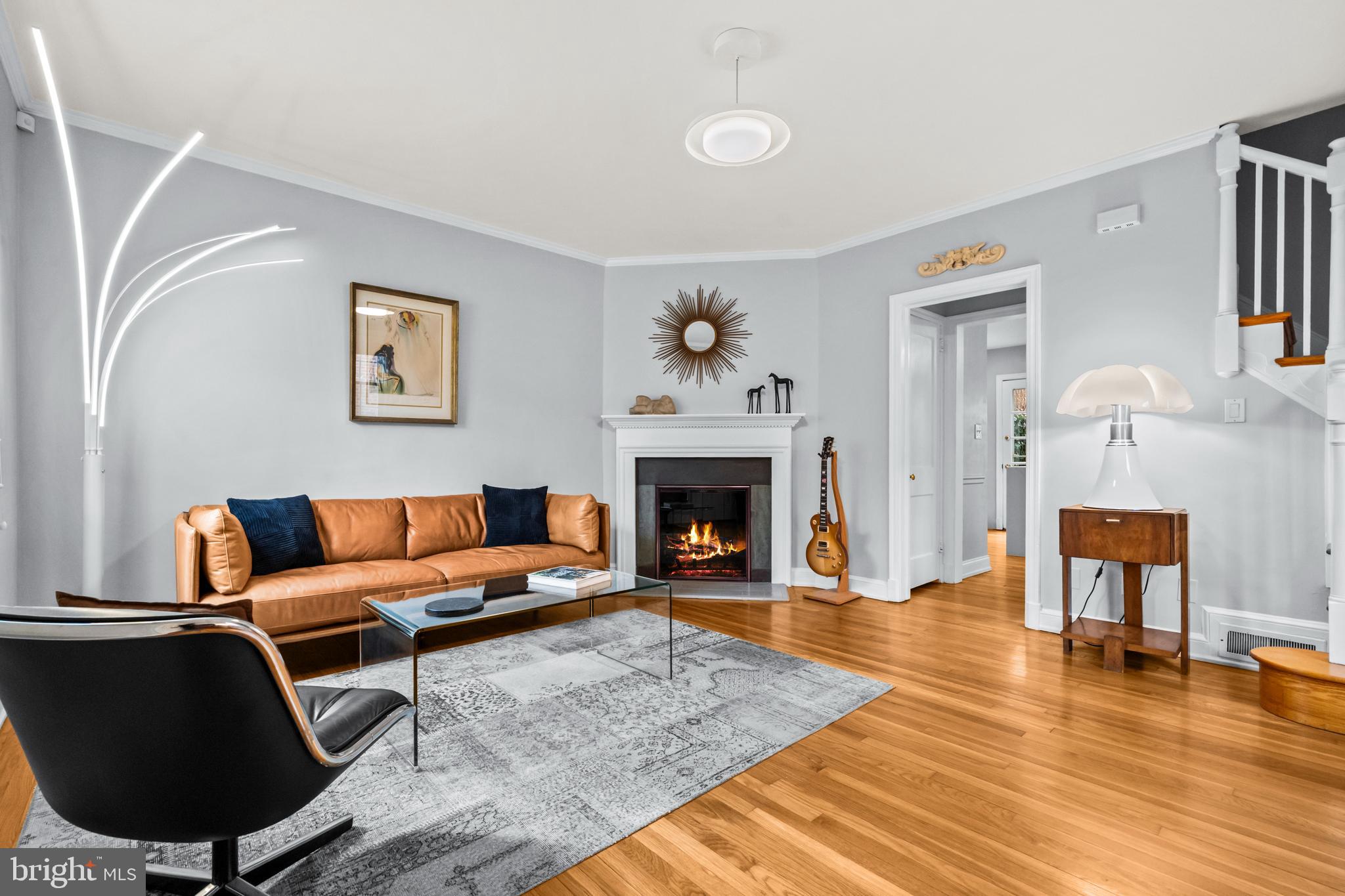 4228 40th Street Northwest Washington, DC 20016 - Photo 4 of 57 a living room with furniture and a fireplace