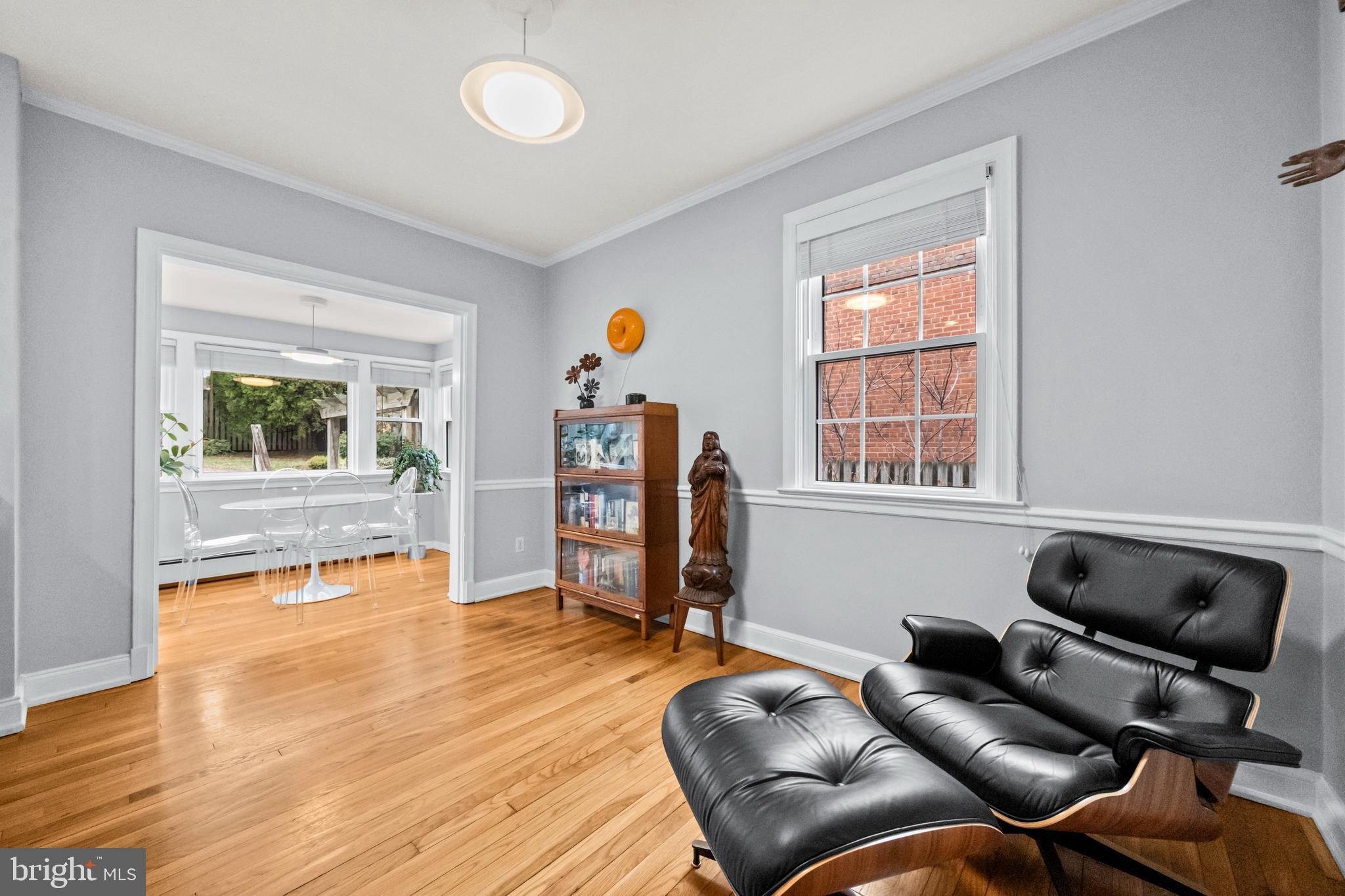 4228 40th Street Northwest Washington, DC 20016 - Photo 9 of 57 a living room with furniture and a window