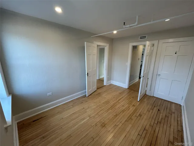a view of livingroom with hardwood floor and a ceiling fan