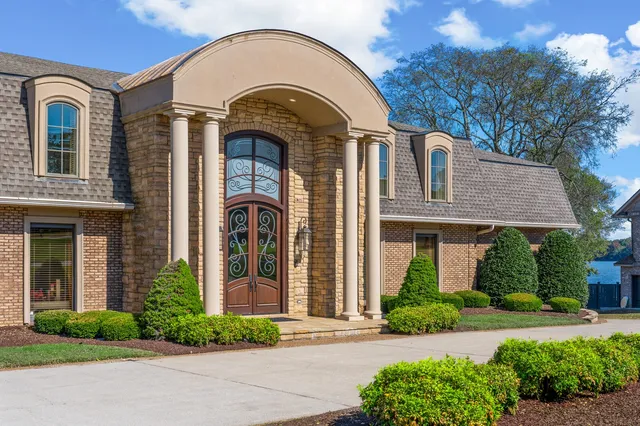 a utility room with sink dryer and washer