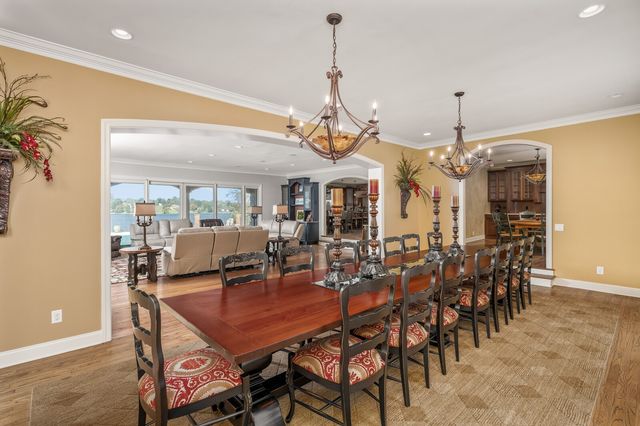 a kitchen with stainless steel appliances granite countertop a stove and a sink