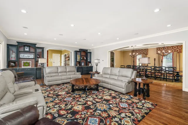 a kitchen with stainless steel appliances a refrigerator and cabinets