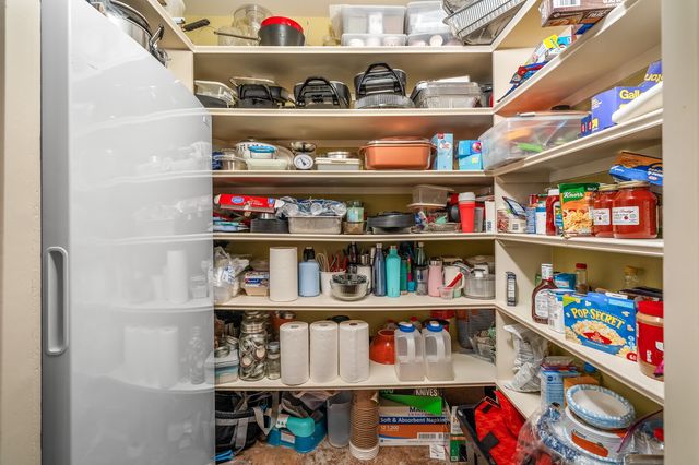 an aerial view of a house with garden space ocean view